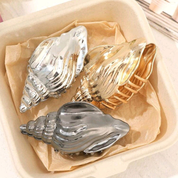 Metallic shell hair claws